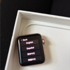 Apple Smartwatch with Black Screen and Gold Edges